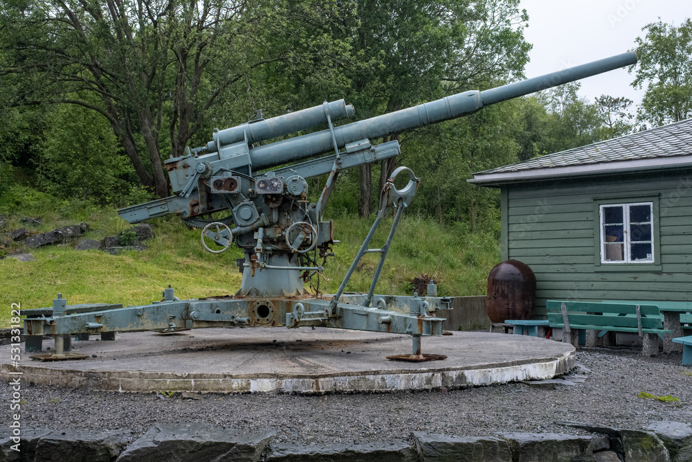 Herdla, Norway - June 16, 2022: Herdla Fort was built by the Germans during Second World War with batteries and bunker facilities. It's completed with a torpedo station in 1944. Selective focus Herdla, Norway - June 16, 2022: Herdla Fort was built by the Germans during Second World War with batteries and bunker facilities. It's completed with a torpedo station in 1944. Selective focus