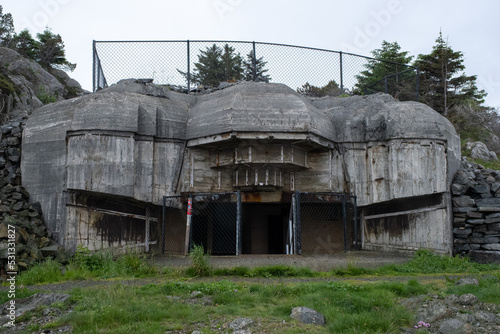 Herdla, Norway - June 16, 2022: Herdla Fort was built by the Germans during Second World War with batteries and bunker facilities. It's completed with a torpedo station in 1944. Selective focus photo