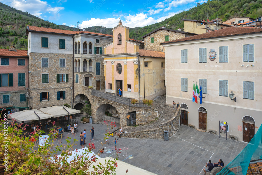 View of the main square of Apricale, a small ancient village of stone-made houses above the Ligurian Alps (Northern Italy), close to the borders between Italy and France.