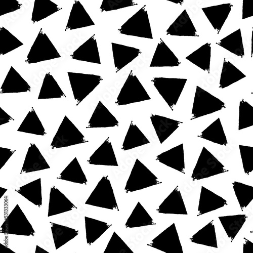 Small black ink triangles isolated on white background. Monochrome geometric seamless pattern. Vector simple flat graphic hand drawn illustration. Texture.