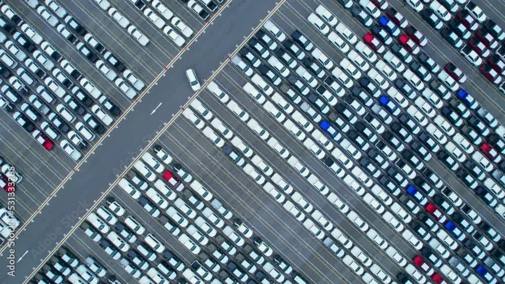 Top view of many cars at the parking lots, new cars lined up. import and export industry. automotive industry. aerial view from drones. 4K
Top view of many cars at the parking lots, new cars lined up. import and export industry. automotive industry. aerial view from drones. 4K