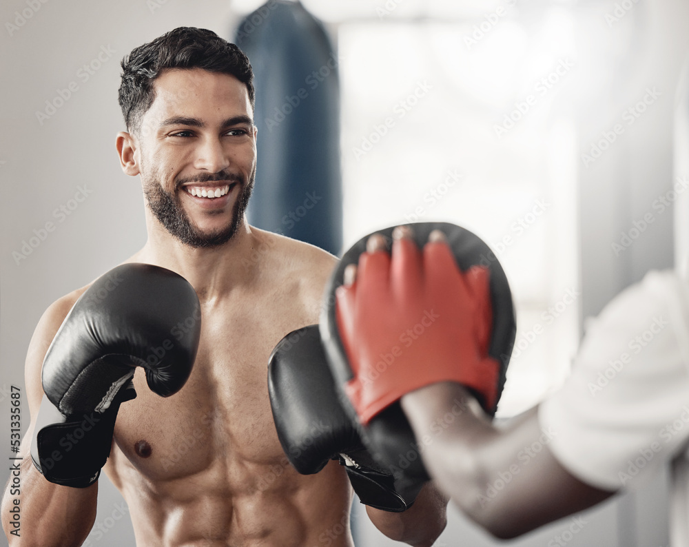 Fitness boxing, happy man training workout and cardio exercise motivation goals. Healthy muay thai athlete, strong ab muscle power and young sports mma boxer smile in gym with boxing gloves