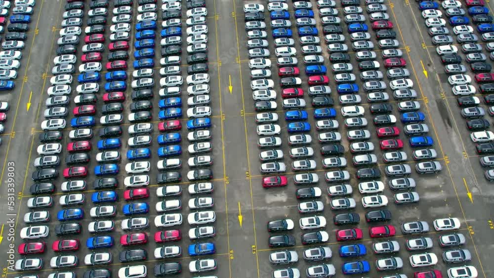 Drones flying over of many vehicles at parking lots. new cars lined up for import and export. automotive industry. 4k stock footage
Drones flying over of many vehicles at parking lots. new cars lined up for import and export. automotive industry. 4k stock footage
