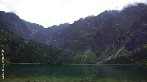 Morskie Oko (Sea Eye) is largest and fourth-deepest lake in Tatra Mountains. It is located deep within Tatra National Park, Poland, in Rybi Potok (Fish Brook) Valley, at base of Mieguszowiecki Summits photo