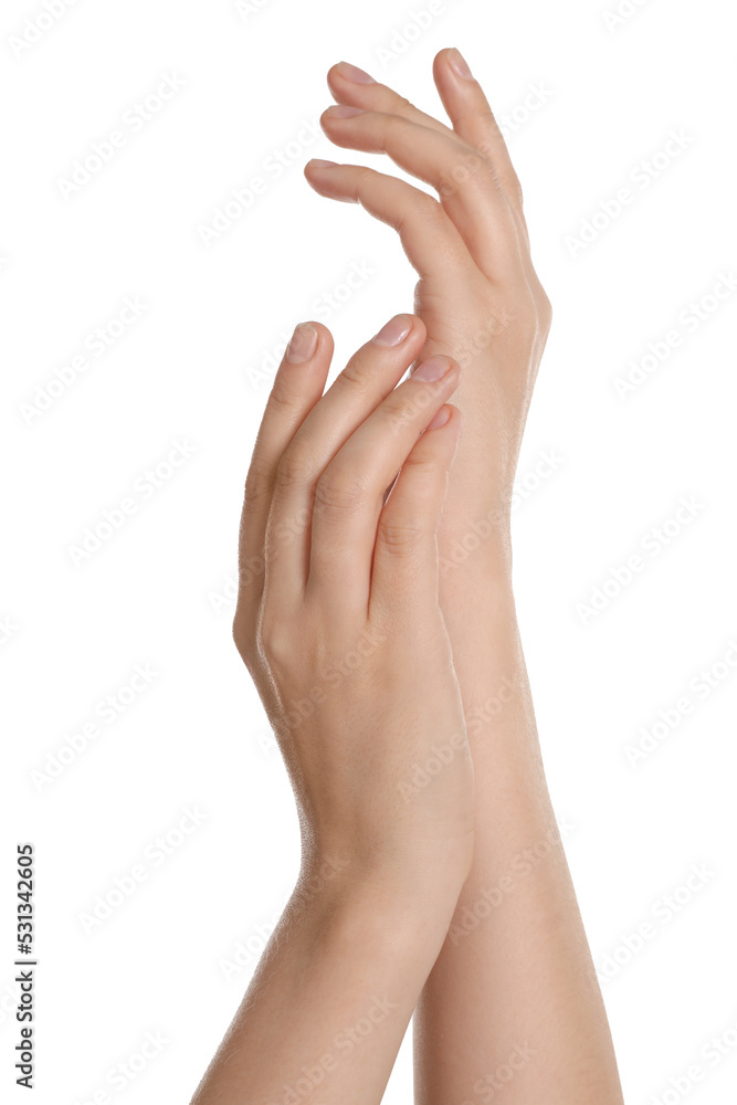 Woman applying cream on hand against white background, closeup Woman applying cream on hand against white background, closeup