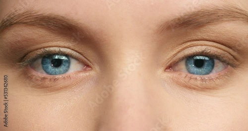 Beauty, vision and eye zoom of woman after ocular ophthalmology surgery focus dilated pupils to test for glaucoma or eyesight. Face of girl with closeup of beautiful, natural and healthy blue eye