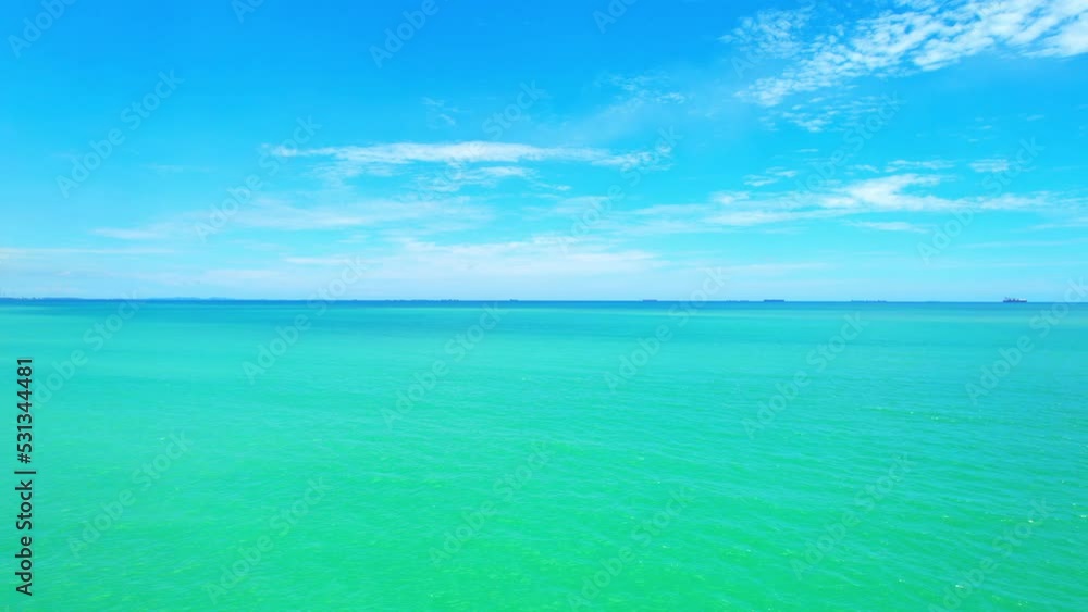 4K Aerial view of drone moving on beautiful sea, Flight over ocean. Dynamic aerial shot. Perfect for holiday summer background. Tropical sea in the Gulf of Thailand. Drone 4k shot.
4K Aerial view of drone moving on beautiful sea, Flight over ocean. Dynamic aerial shot. Perfect for holiday summer background. Tropical sea in the Gulf of Thailand. Drone 4k shot.