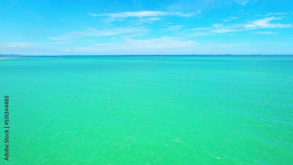 4K drone aerial view of beautiful ocean waves, fly over the sea, small waves in the sea. sea in the tropics. Background footage for summer. cinematic drone shot. Gulf of Thailand, Rayong, Thailand
4K drone aerial view of beautiful ocean waves, fly over the sea, small waves in the sea. sea in the tropics. Background footage for summer. cinematic drone shot. Gulf of Thailand, Rayong, Thailand