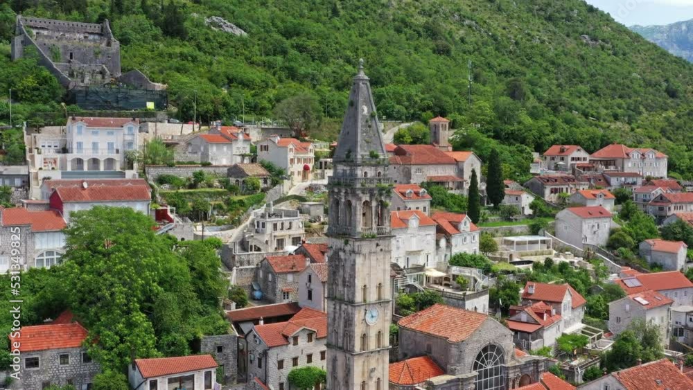 Aerial around view of belfry in old Perast town, Bay of Kotor - Boka Bay, Montenegro, 4k Aerial around view of belfry in old Perast town, Bay of Kotor - Boka Bay, Montenegro, 4k