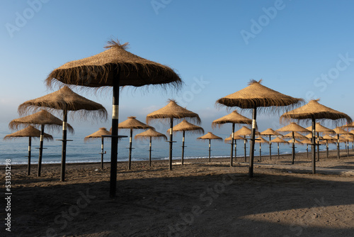 Fototapeta Naklejka Na Ścianę i Meble -  Malaga Spain beach unbrellas