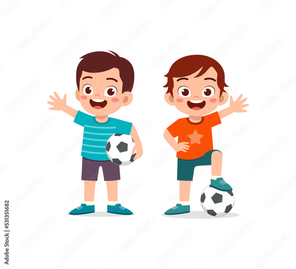 little kid play football together with friend little kid play football together with friend