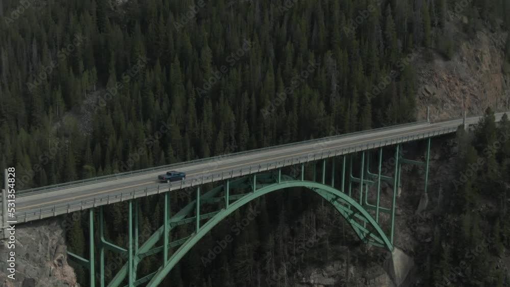 Aerial of green cantilevered steel arch bridge near Red Cliff, Colorado in summer on US 24 highway Aerial of green cantilevered steel arch bridge near Red Cliff, Colorado in summer on US 24 highway