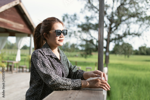 Smiling woman wearing natural glasses