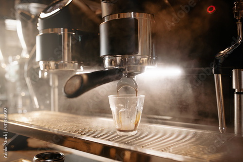 espresso machine pouring coffee