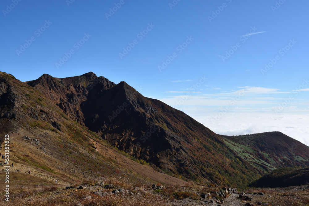 Climbing mountain in autumn, Nasu, Tochigi, Japan Climbing mountain in autumn, Nasu, Tochigi, Japan