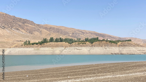 Beautiful mountain lake. Rocky mountains and hills of Kyrgyzstan.