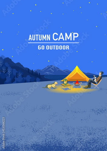 Young man enjoying night camp in autumn with his dog - Vertical, Included words