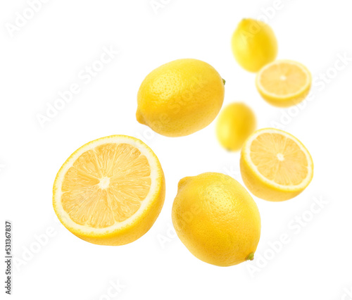 Fresh lemon with cut in half levitate isolated on white background.