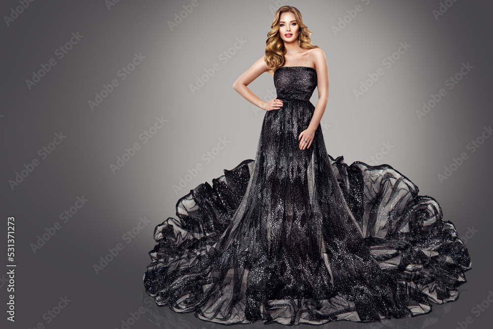 High Fashion Woman in Black Luxury Dress. Blonde Model in Long Glitter  Tulle Gown. Women Party Make up and Curly Hair Style over Dark Gray  Background Stock Photo | Adobe Stock