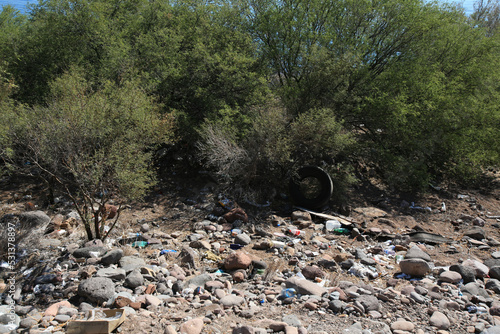 Garbage: plastic, cars parts, construction left overs, etc. along the road between Ciudad Insurgentes and Mulege, Baja California Sur, Mexico. 