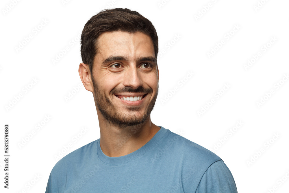 Close up portrait of smiling handsome male in blue t-shirt looking right Close up portrait of smiling handsome male in blue t-shirt looking right