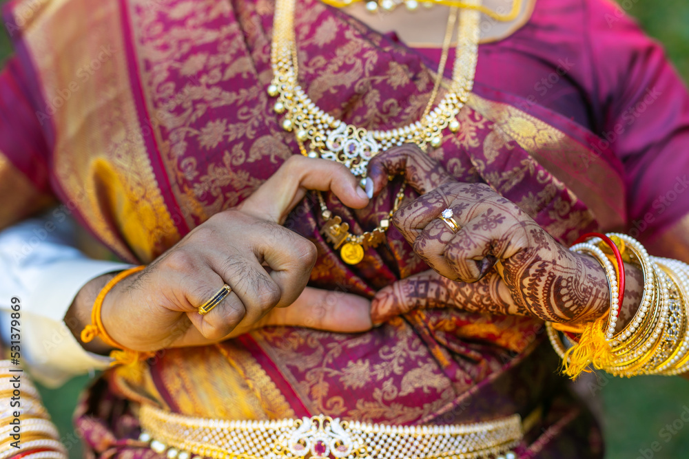 South Indian Tamil couple's holding hands close up
