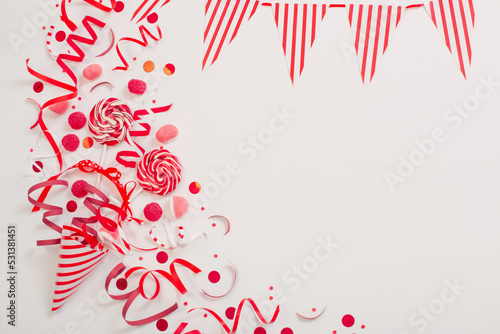 birthday background with red and white paper birthday decotations photo