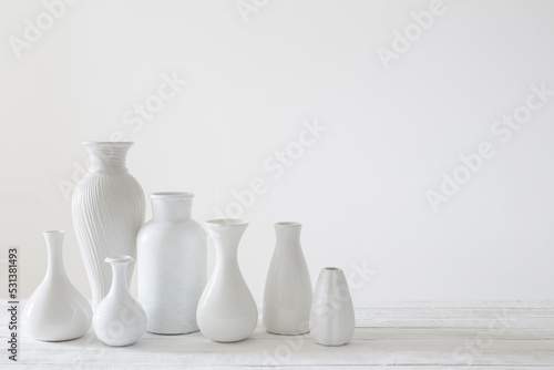 Murais de parede ceramic white vases on white background