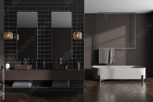 Grey bathroom interior with two washbasin and tub  accessories