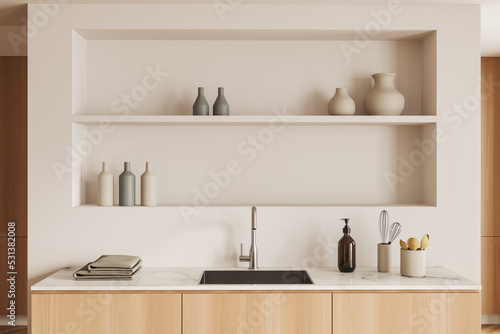 Light cooking space interior with sink and minimalist kitchenware © ImageFlow