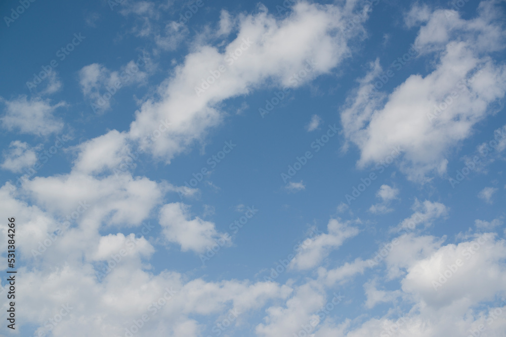 Naklejka premium Blue sky with white clouds