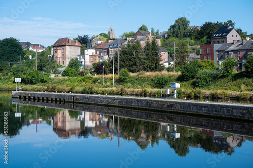 Namur  Wallon Region  Belgium   Worker houses reflecting in the banks of the River Sambre