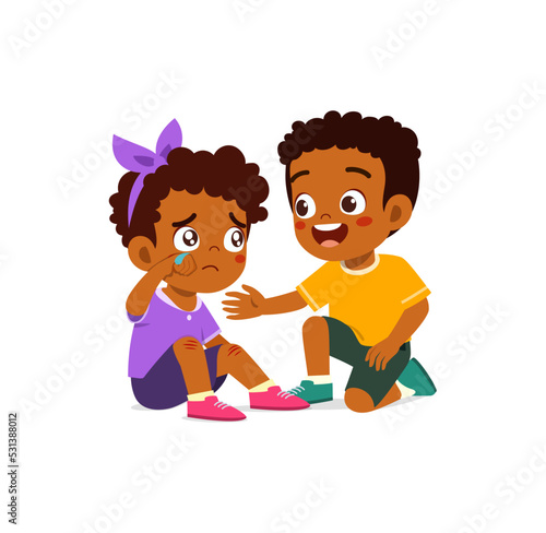 good little kid helping friend that falling on the floor