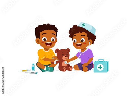 little kid wearing doctor costume and play