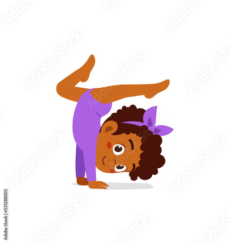 little gymnast kid do exercise on the floor