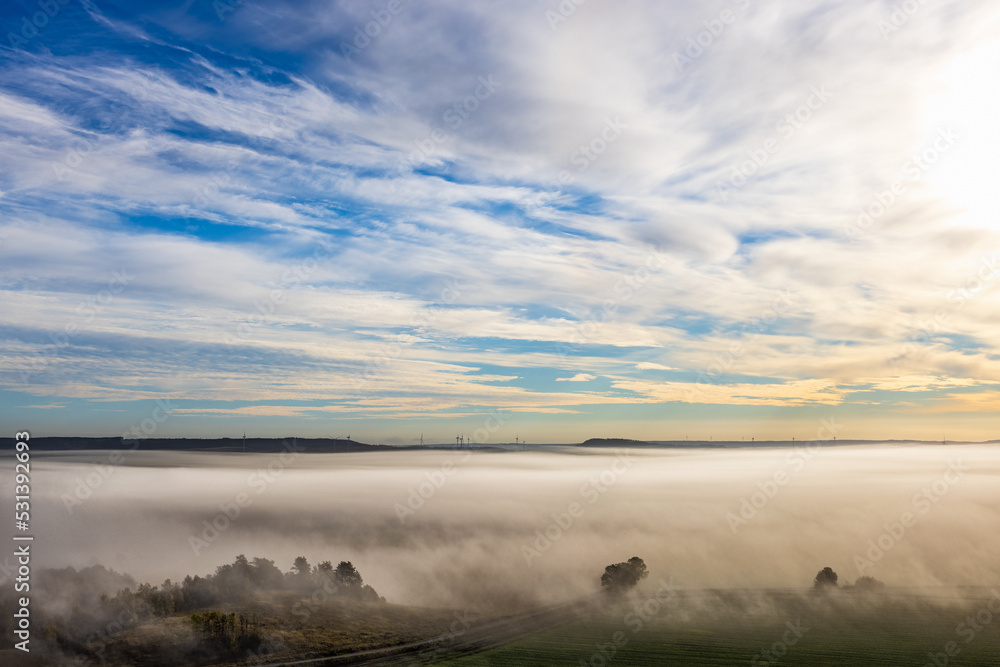 Sunrise with fog over the landscape Sunrise with fog over the landscape