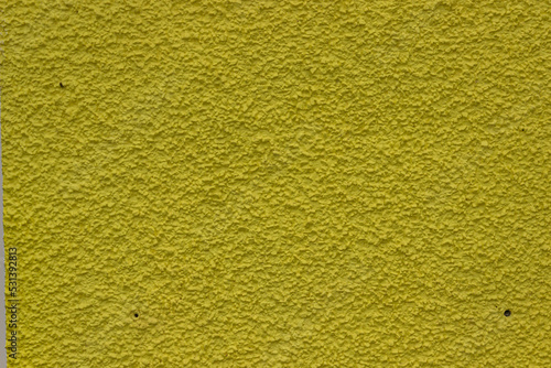 Grain yellow paint wall background or texture