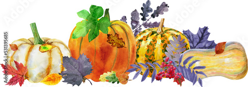 Horizontal composition of pumpkins and autumn leaves