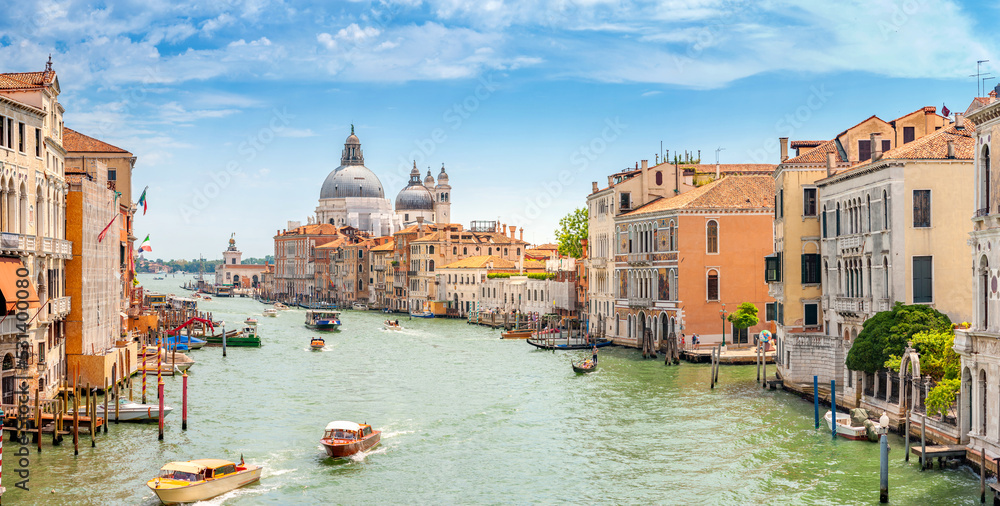 View of Grand Canal and Basilica Santa Maria della Salute in Venice, Italy. Summer holidays. Travel concept background.