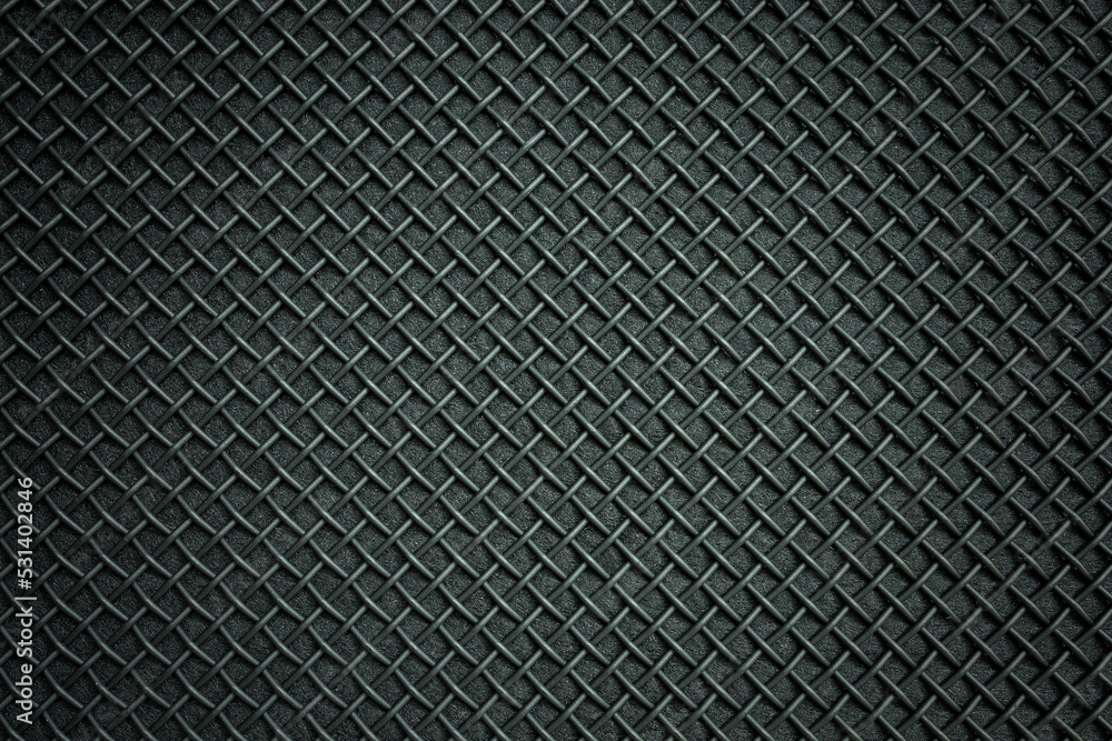 Abstract black metallic mesh texture of the speaker for background.