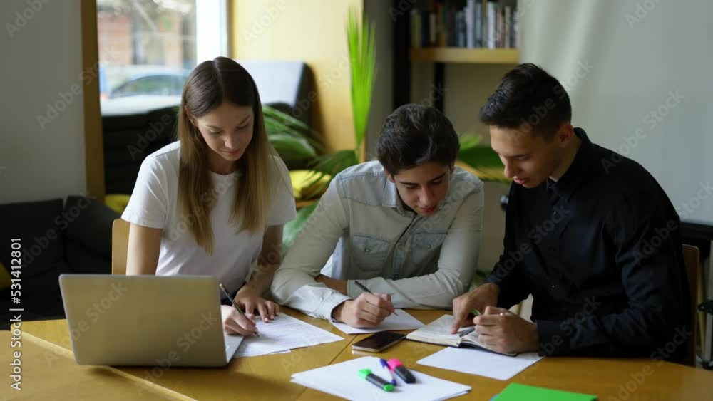 Business concept. The young team is planning together within the company Business concept. The young team is planning together within the company