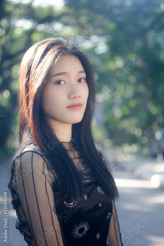 asia thai teen black dress beautiful girl smile and relax
