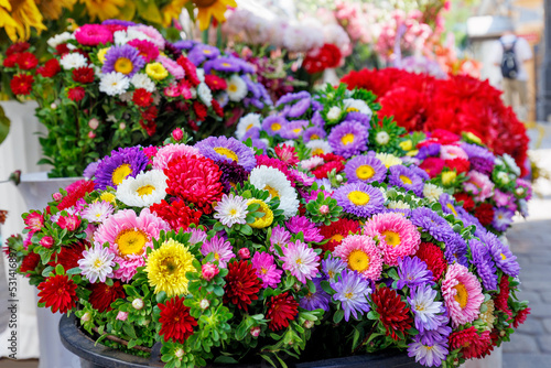 Wallpaper Mural Beautiful bouquets of fresh and bright multi-colored chrysanthemums close-up on a warm autumn day. Torontodigital.ca