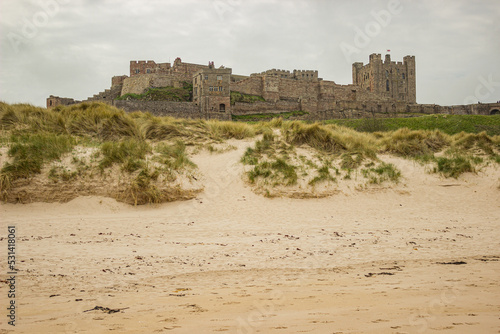 Bamburgh Castle, North East Coast of England, taken from the beach photo