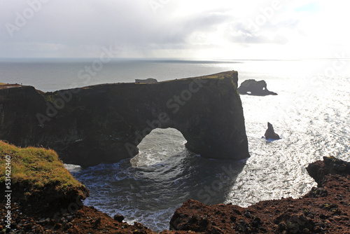 Dyrhólaey - the massive arch in Dyrholafjara beach, Katla Geopark, Iceland photo