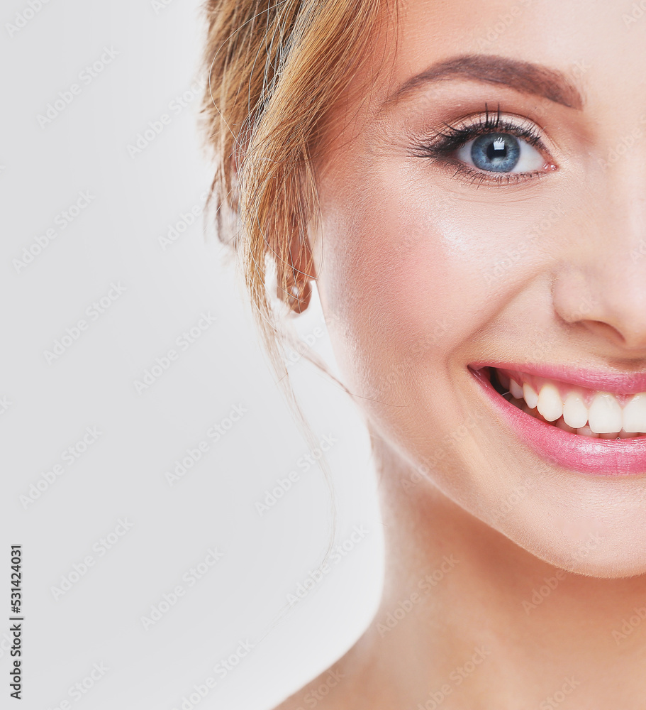 Fototapeta premium Studio shot of a beautiful young woman with perfect skin against a gray background.