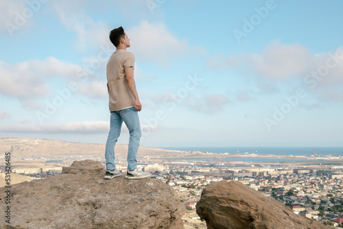 man standing on the beach