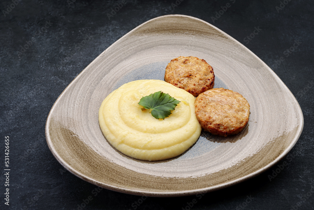 Mashed potatoes with steam cutlets and parsley Mashed potatoes with steam cutlets and parsley