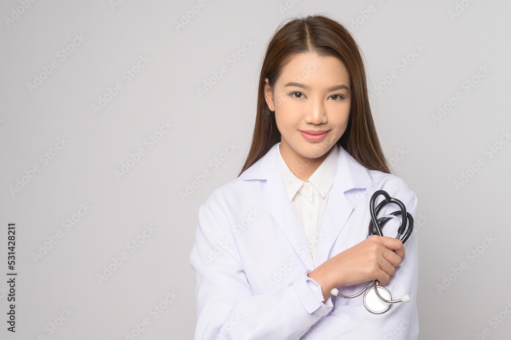 Portrait of female confident doctor over white background studio, healthcare and Medical technology concept. Portrait of female confident doctor over white background studio, healthcare and Medical technology concept.