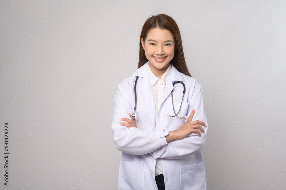 Portrait of female confident doctor over white background studio, healthcare and Medical technology concept. Portrait of female confident doctor over white background studio, healthcare and Medical technology concept.